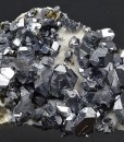 Truncated Galena on matrix with Sphalerite inclusions, Calcite