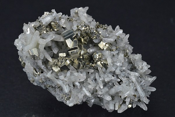 Japan Law Twin Quartz with Pyrite inclusions, Calcite