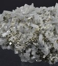 Japan Law Twin Quartz with Pyrite inclusions, Calcite