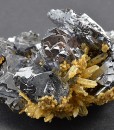 Iron Oxide, Spinel Law Twin Galena set on Quartz and Calcite