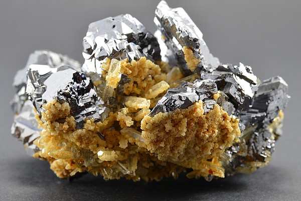 Iron Oxide, Spinel Law Twin Galena set on Quartz and Calcite
