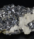 Rhombohedral Calcite set on twinned Galena, Chalcopyrite, Quartz