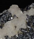 Rhombohedral Calcite set on twinned Galena, Chalcopyrite, Quartz
