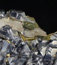 Rhombohedral Calcite set on twinned Galena, Chalcopyrite, Quartz