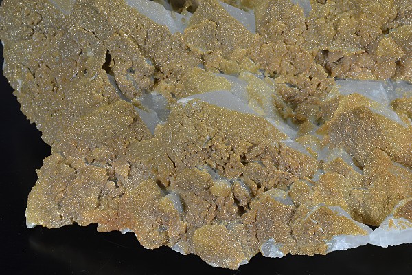 Hexagonal pyramidal Quartz tinged with Calcite