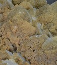Hexagonal pyramidal Quartz tinged with Calcite