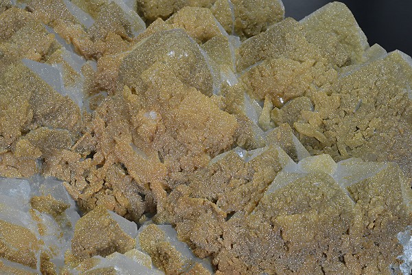 Hexagonal pyramidal Quartz tinged with Calcite