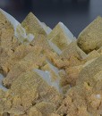 Hexagonal pyramidal Quartz tinged with Calcite