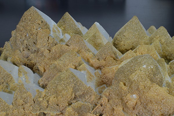 Hexagonal pyramidal Quartz tinged with Calcite