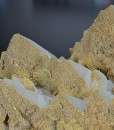 Hexagonal pyramidal Quartz tinged with Calcite