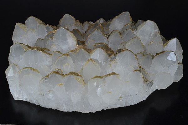 Hexagonal pyramidal Quartz tinged with Calcite