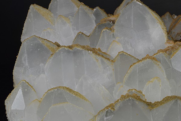 Hexagonal pyramidal Quartz tinged with Calcite