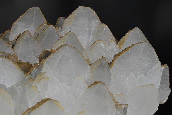 Hexagonal pyramidal Quartz tinged with Calcite