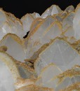 Hexagonal pyramidal Quartz tinged with Calcite