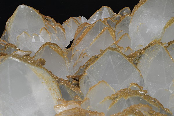 Hexagonal pyramidal Quartz tinged with Calcite