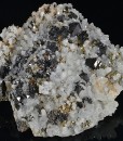Sphalerite and Pyrite on Quartz with growth phantoms, Calcite