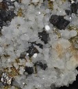 Sphalerite and Pyrite on Quartz with growth phantoms, Calcite