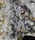 Sphalerite and Pyrite on Quartz with growth phantoms, Calcite