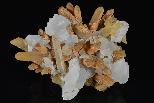 Rhombohedral Calcite set on Quartz