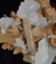 Rhombohedral Calcite set on Quartz