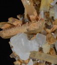 Rhombohedral Calcite set on Quartz