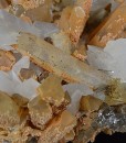 Rhombohedral Calcite set on Quartz