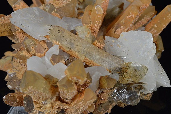 Rhombohedral Calcite set on Quartz