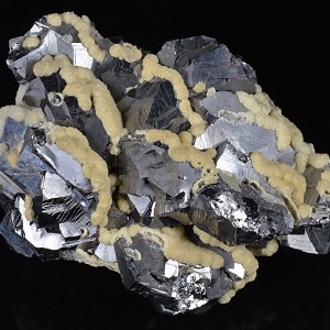 Twinned Galena tinged with Calcite
