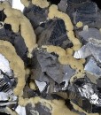 Twinned Galena tinged with Calcite