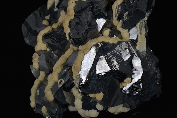 Twinned Galena tinged with Calcite