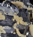 Twinned Galena tinged with Calcite