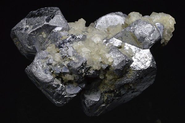Twinned and truncated Galena, Calcite
