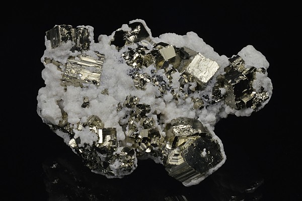Calcite on Pyrite