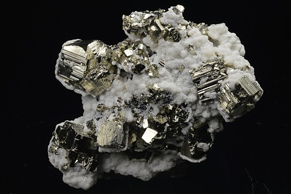 Calcite on Pyrite