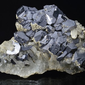 Twinned and truncated Galena on Quartz, Calcite
