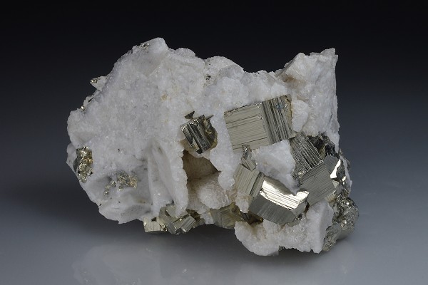 Pyrite on Siderite, Calcite