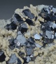 Twinned and truncated Galena on Quartz and Siderite